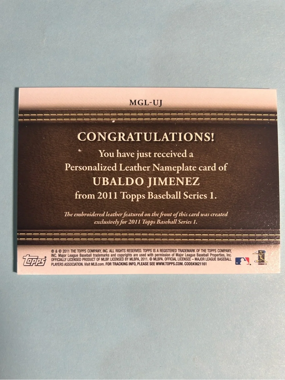 2011,Topps Ubaldo Jimenez ,Colorado Rockies Leather Nameplate Card #MGL-UJ